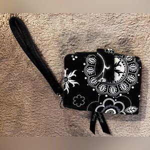 Thirty one card sorting wallet with detachable wristlet.